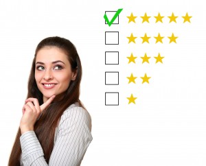 Thinking customer woman choosing five star rating. Good feedback. Isolated on white background