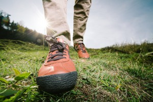 Close-up of female feet in sneakers running outdoors